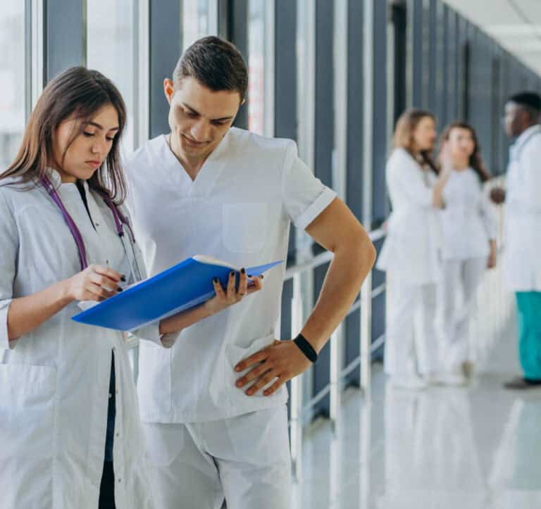 team young specialist doctors standing corridor hospital 1 scaled e1632369226685