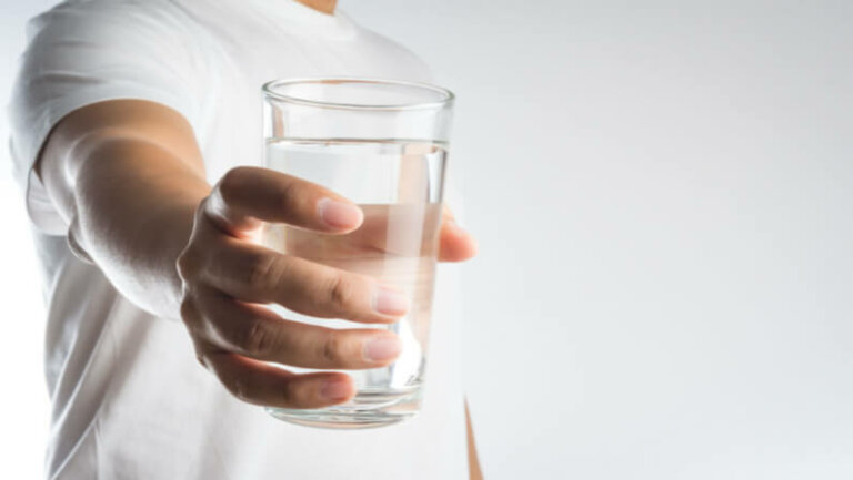 offering a glass of water