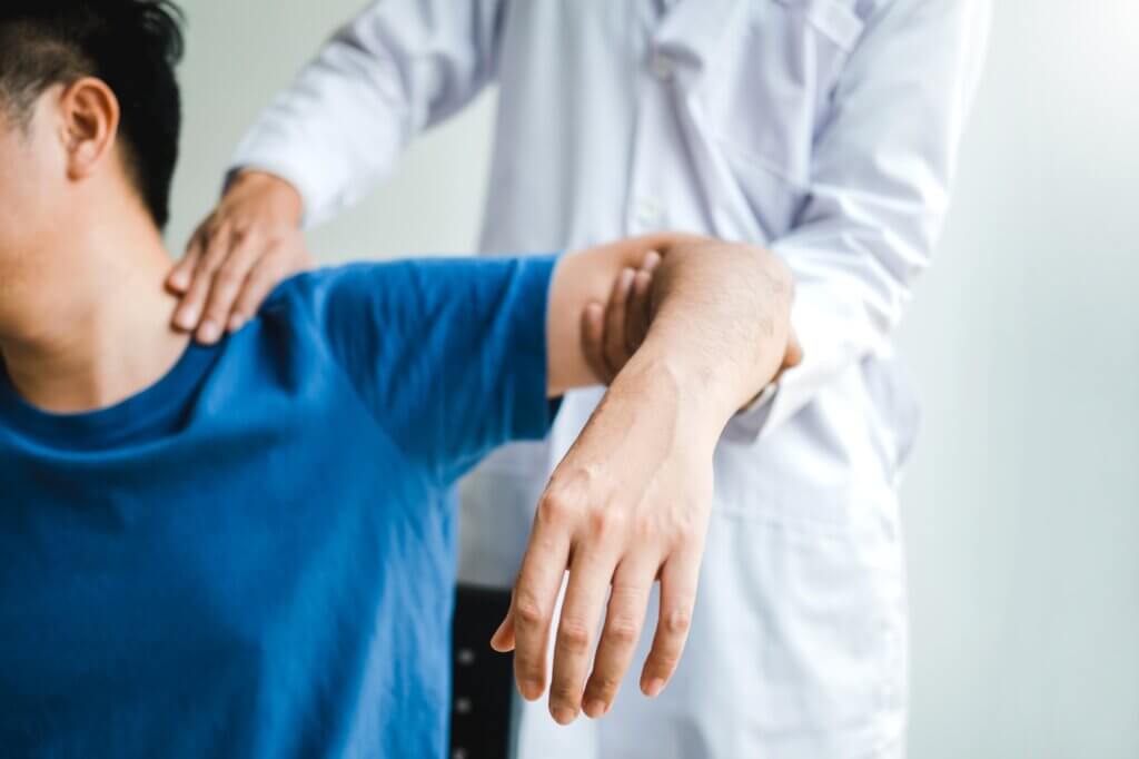 Physical Doctor consulting with patient About muscule pain problems Physical therapy diagnosing concept
